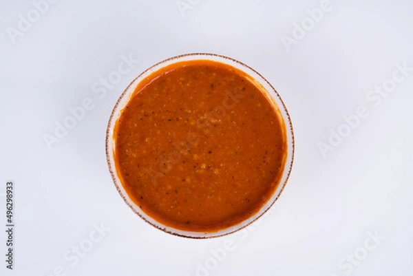 Fototapeta Cropped view of ezogelin soup shot from an overhead angle on an isolated white background.