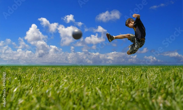Obraz Boy playing soccer - clipping path