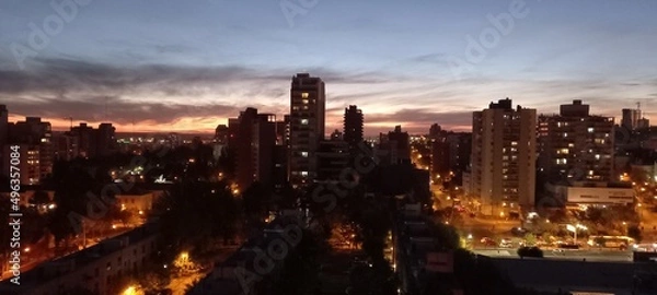 Fototapeta city at sunset