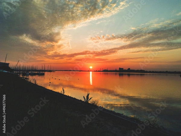 Fototapeta sunset over the river