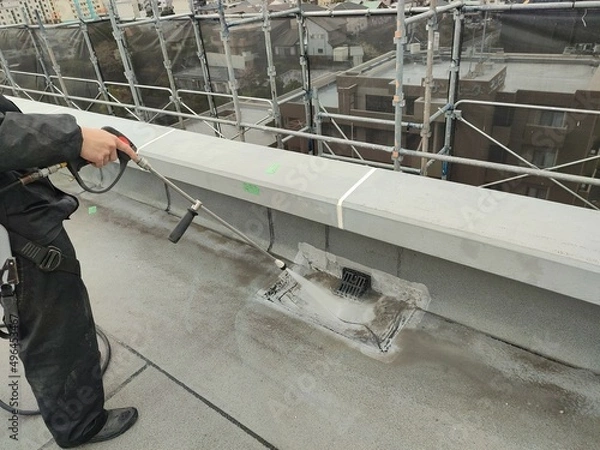 Fototapeta A棟屋上防水改修工事.改修用ドレン取付.高圧水洗浄 状況