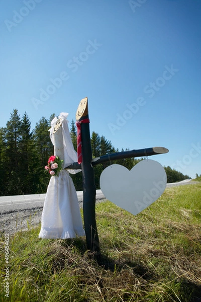 Fototapeta Sign showing the way to the bride and groom's party
