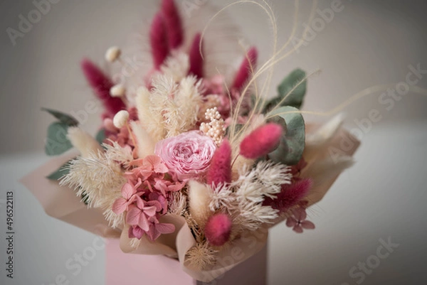 Fototapeta delicate composition of dry and stabilized flowers