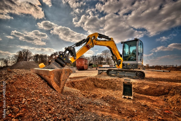 Fototapeta kleiner Bagger