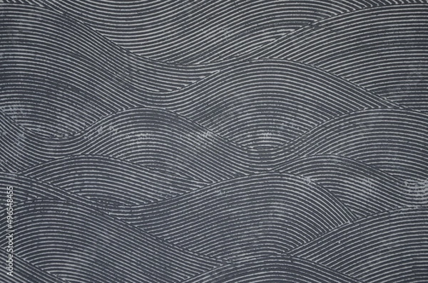 Fototapeta light wavy stripes on a dark background. Decorative plaster . Decoration home. Surface. Backdrop.