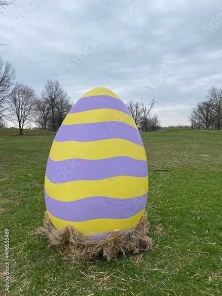 Fototapeta Yellow and Purple Striped Easter Egg