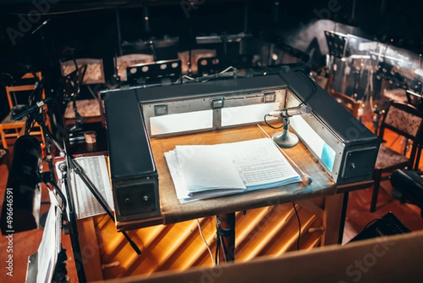 Obraz The conductor's place is in the orchestra pit. A notebook with notes.