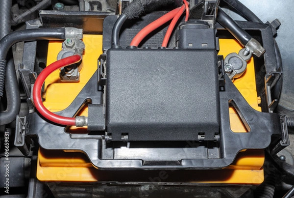 Fototapeta Car battery in the engine compartment