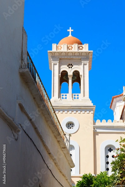 Fototapeta bell tower of the superb Saint Dimitrios church, in the village of Pyrgos, famous for its marble craftsmen, on the island of Tinos, in the Cyclades, in the heart of the Aegean Sea
