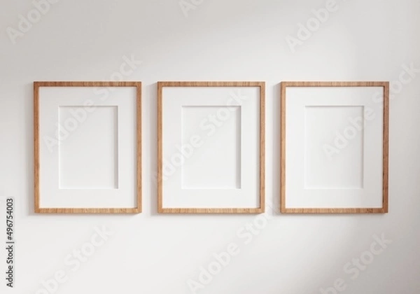 Fototapeta Three empty photo frame for mockup in empty white room. 3D rendering.