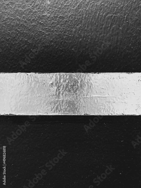 Obraz Silver stripe on black background with blur