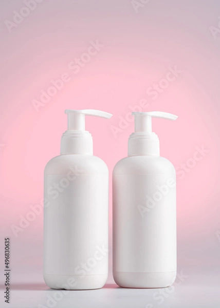 Obraz Blank white Bottles for Cosmetics, Mock up Cream Jar on a Pink light background, Packaging for Cosmetics without logo and label