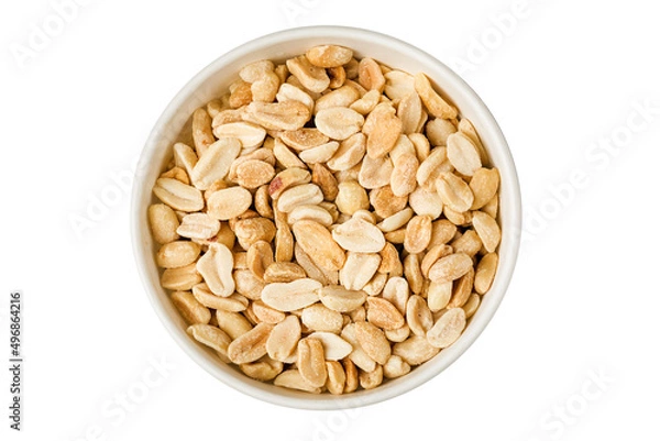 Fototapeta peeled peanuts in a round bowl on a white background. Top view.