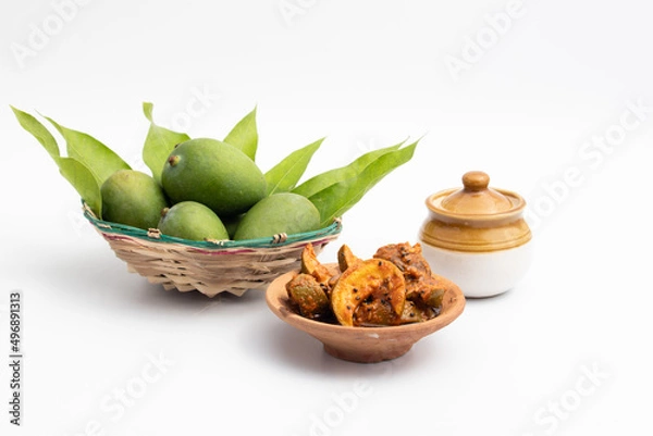 Obraz Mango Pickle Also Known As Aam Ka Achar, Aam Chunda, Maagaya, Avakaya, Urakaya, Kadumanga Achar Is Made Of Raw Unripe Green Mangoes And Assorted Indian Spices Masala. White Backgronund With Copy Space