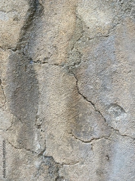 Fototapeta blurred background of granite stone wall, close up stone texture