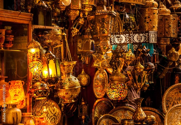 Fototapeta Various arabic antique objects displayed in an old shop in the bazaar. Typical shop in an egyptian market.