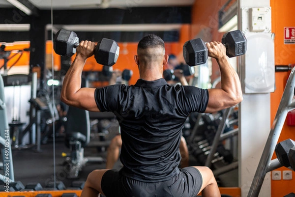 Obraz person lifting weights