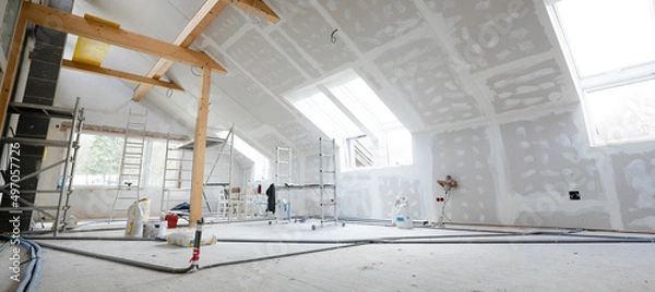 Fototapeta Attic finishing construction site in the phase drywall spackling and plastering before screeding
