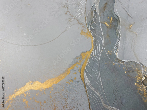 Obraz Abstract textured art with gold and silver — grey background with beautiful smudges made with alcohol ink, silver acrylic and golden paint. Fluid texture resembles marble and aquarelle.