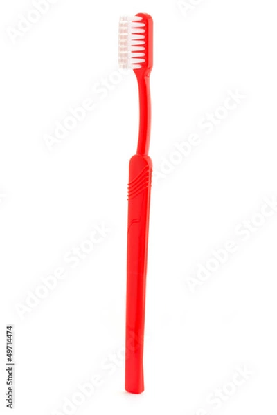Fototapeta Single red toothbrush on white