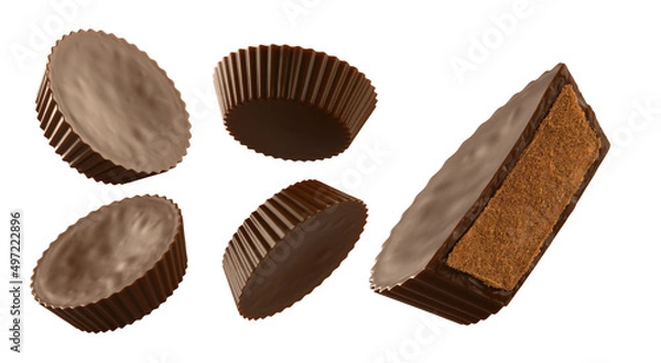 Obraz Set of chocolate peanut butter cups. Isolated on background. 3d illustration