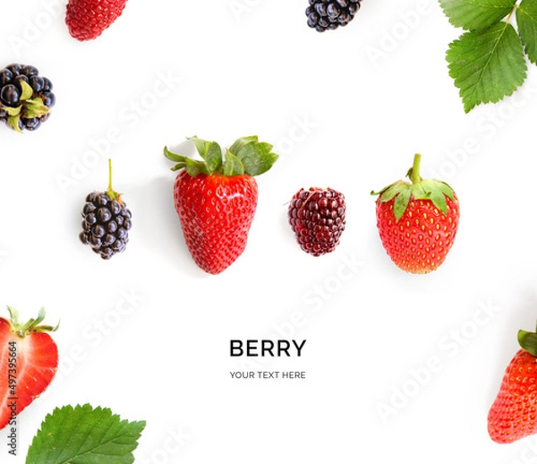 Fototapeta Creative layout made of strawberry and blackberry on a white background. Top view