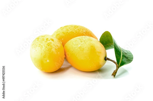 Fototapeta Marian Plum, Plum Mango, yellow fresh fruit and green leaf. Summer fruit with a sweet and sour taste. isolated on white background.