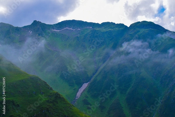 Fototapeta clouds over the mountains