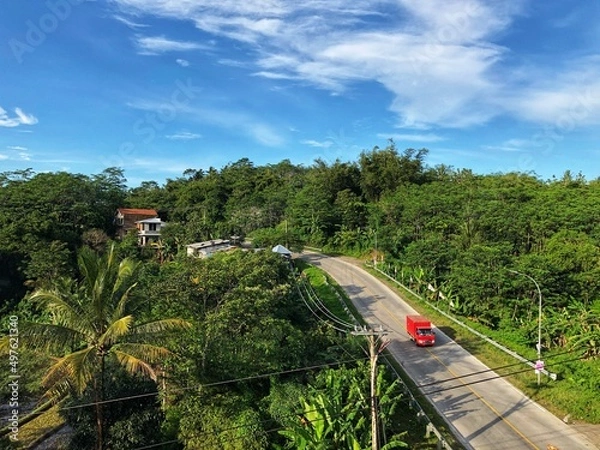 Obraz An atmosphere of early morning traffic in the city of Bumiayu, Central Java, Indonesia.