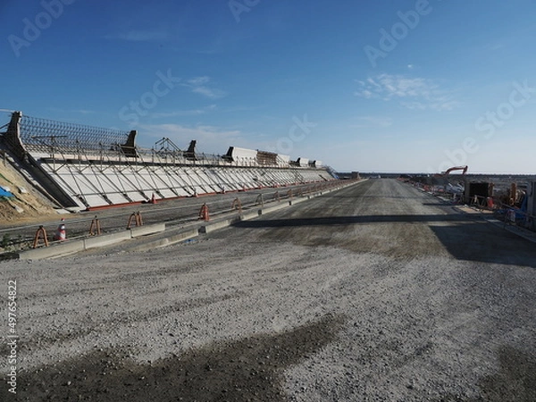 Obraz 防波堤の道路の工事現場