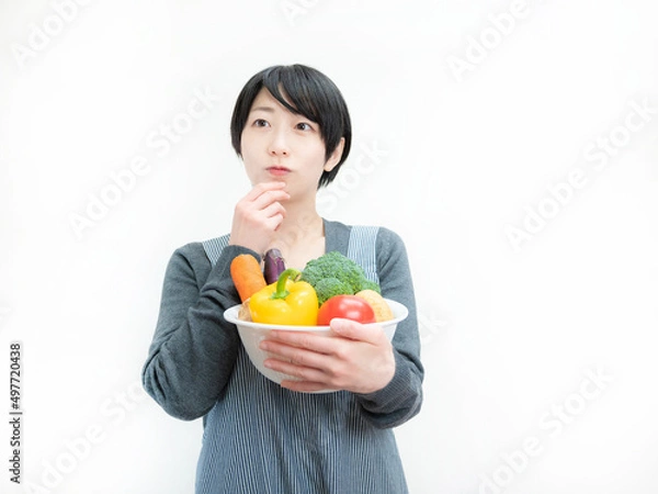 Fototapeta 複数の野菜と女性