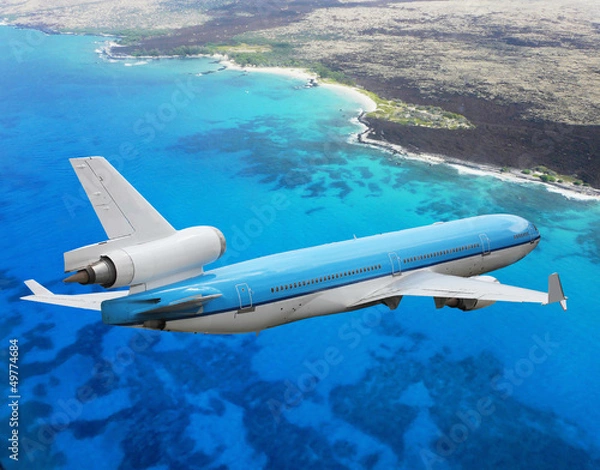 Obraz plane descending above sea