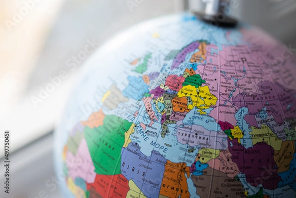 Fototapeta Globe with map of Europe with focus on Ukraine. For peace in Ukraine.