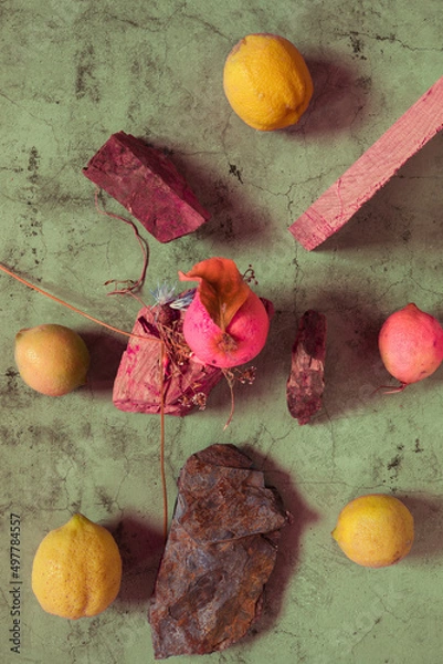 Fototapeta Still Life yellow and green lemons composition in a stone background