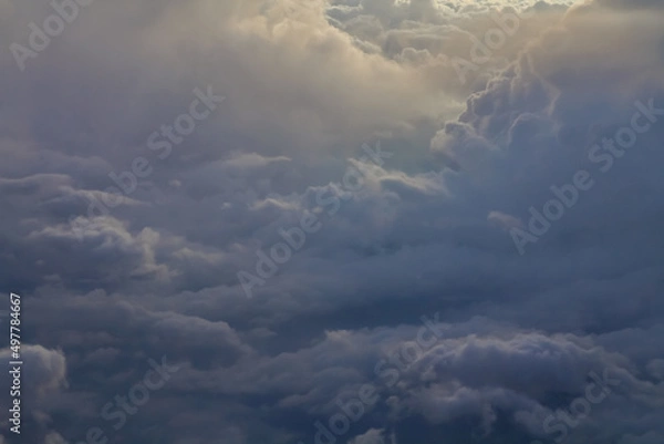 Fototapeta A view of the clouds from an airplane