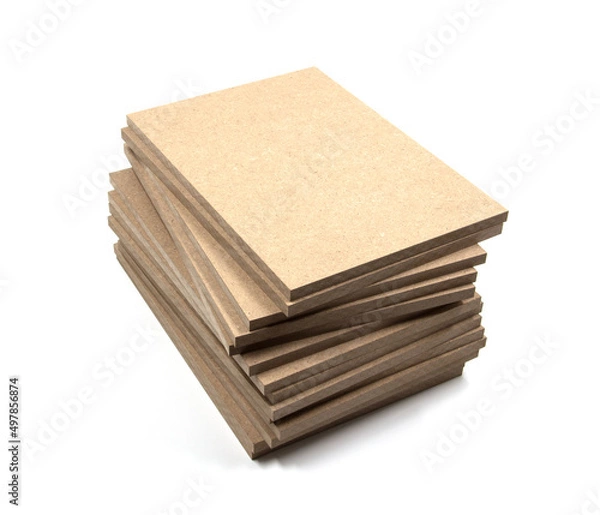 Fototapeta A pile of planks of raw MDF cut in a rectangular shape, of identical dimensions.