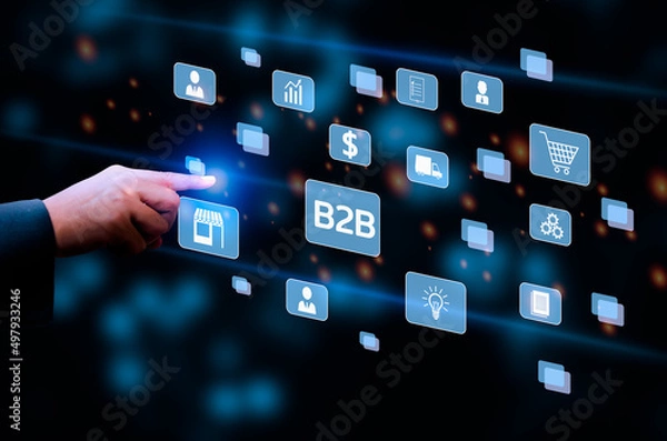 Fototapeta Businessman touching on virtual screen icon B2B Business to Business icons and symbols.