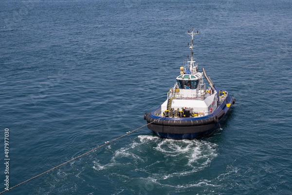 Obraz Tugboat during mooring operation at sea