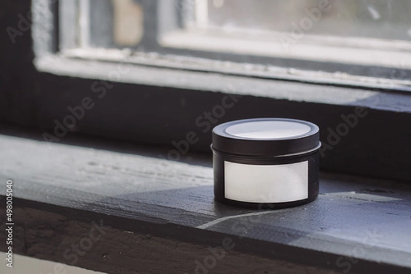 Obraz Black candle with white label