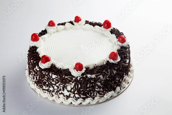 Obraz Black Forest cake with icing and cherries