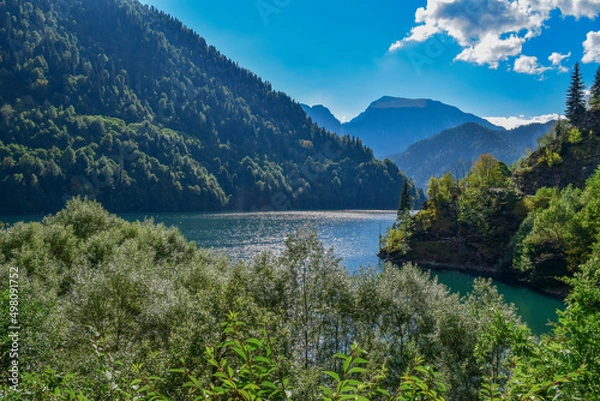 Fototapeta Landscape of Lake Ritsa surrounded by the Caucasian mountains in Abkhazia