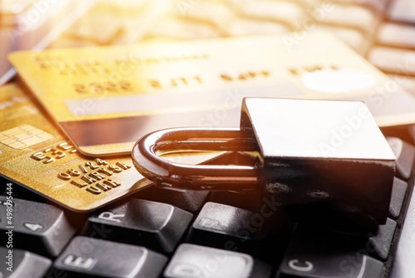 Obraz Security lock on credit cards with computer keyboard - credit card data security