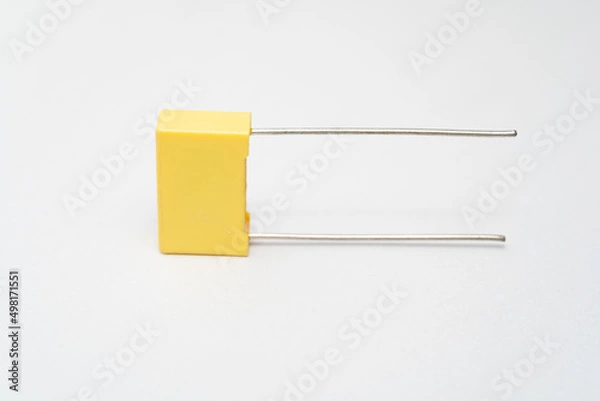 Fototapeta Isolated capacitor, used in electronic device. Electronic parts concept.