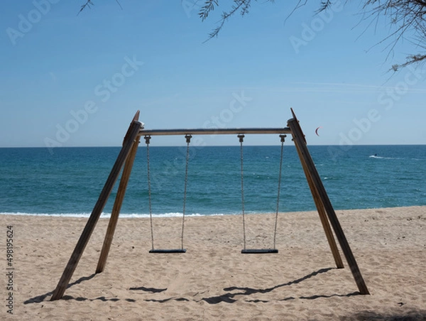 Fototapeta Columpio en la playa vacío