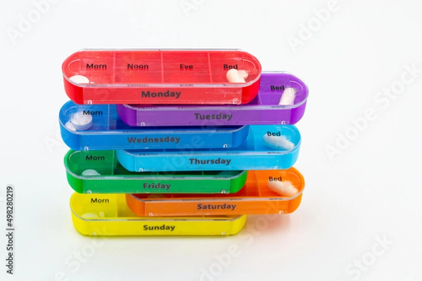 Obraz colored container with pills for every day