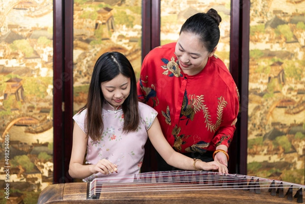 Fototapeta Learn guzheng playing