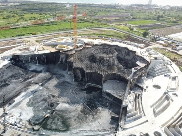 Fototapeta Acre, Israel - April 11 2022:  after a Bahai construction site caught fire and burned for hours on 8.4.22