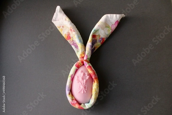 Fototapeta Easter eggs shaped candles. Soy wax blend hand-poured candles for easter decoration