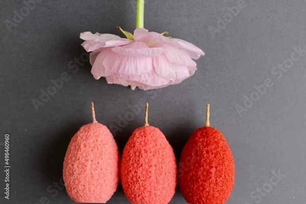 Fototapeta Easter eggs shaped candles. Soy wax blend hand-poured candles for easter decoration