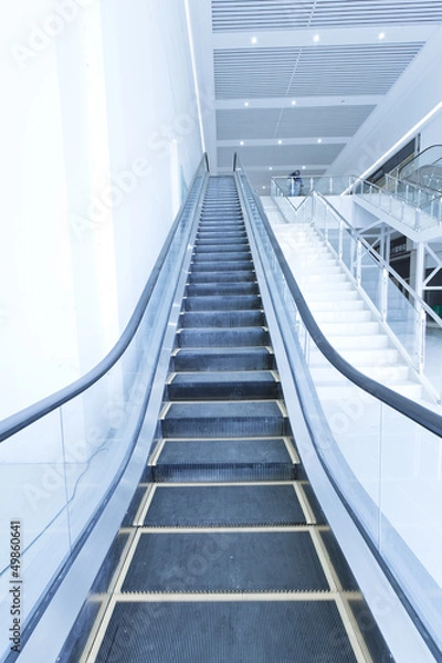 Obraz Escalator in modern interior toned